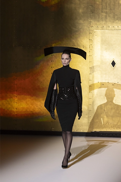 Look N°1 — Black crepe dress with rolled satin sleeves and embroidered black organza matador belt by STÉPHANE ROLLAND